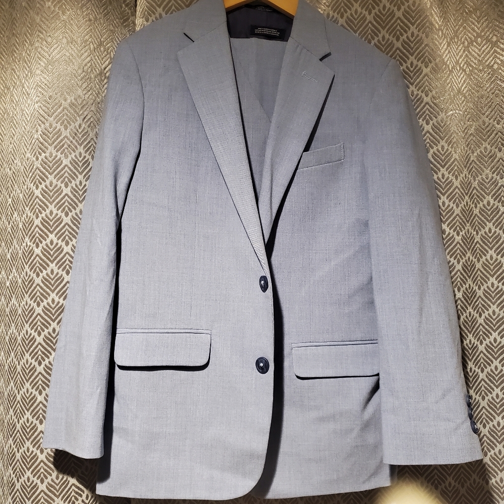 Boys size 14 Nautica 3-piece blue suit. Like new!